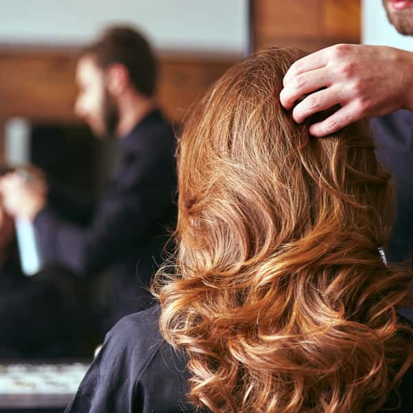 stock-image-redhead-getting-hair-styled