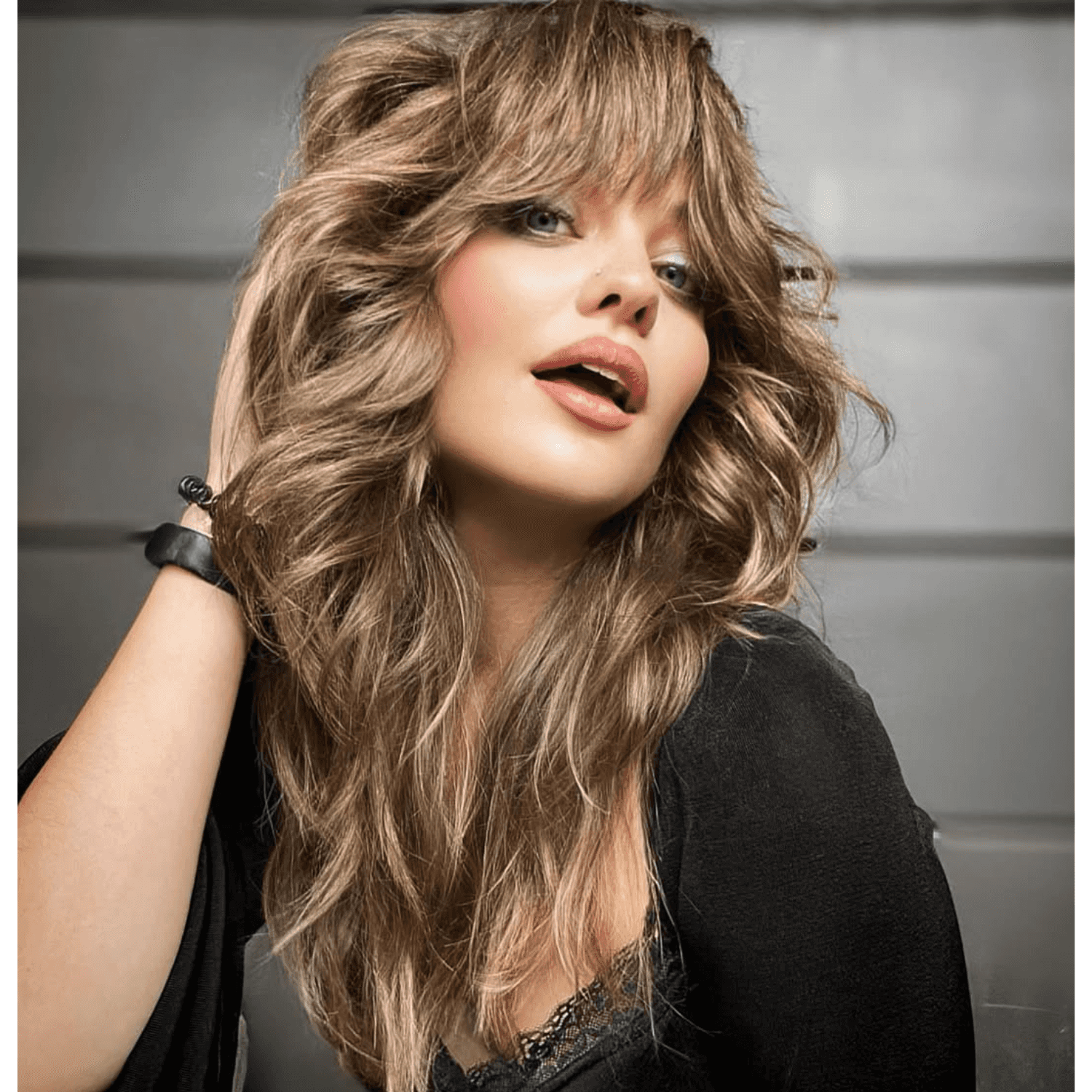 A retro brunette shag haircut by @rachelwstylist.