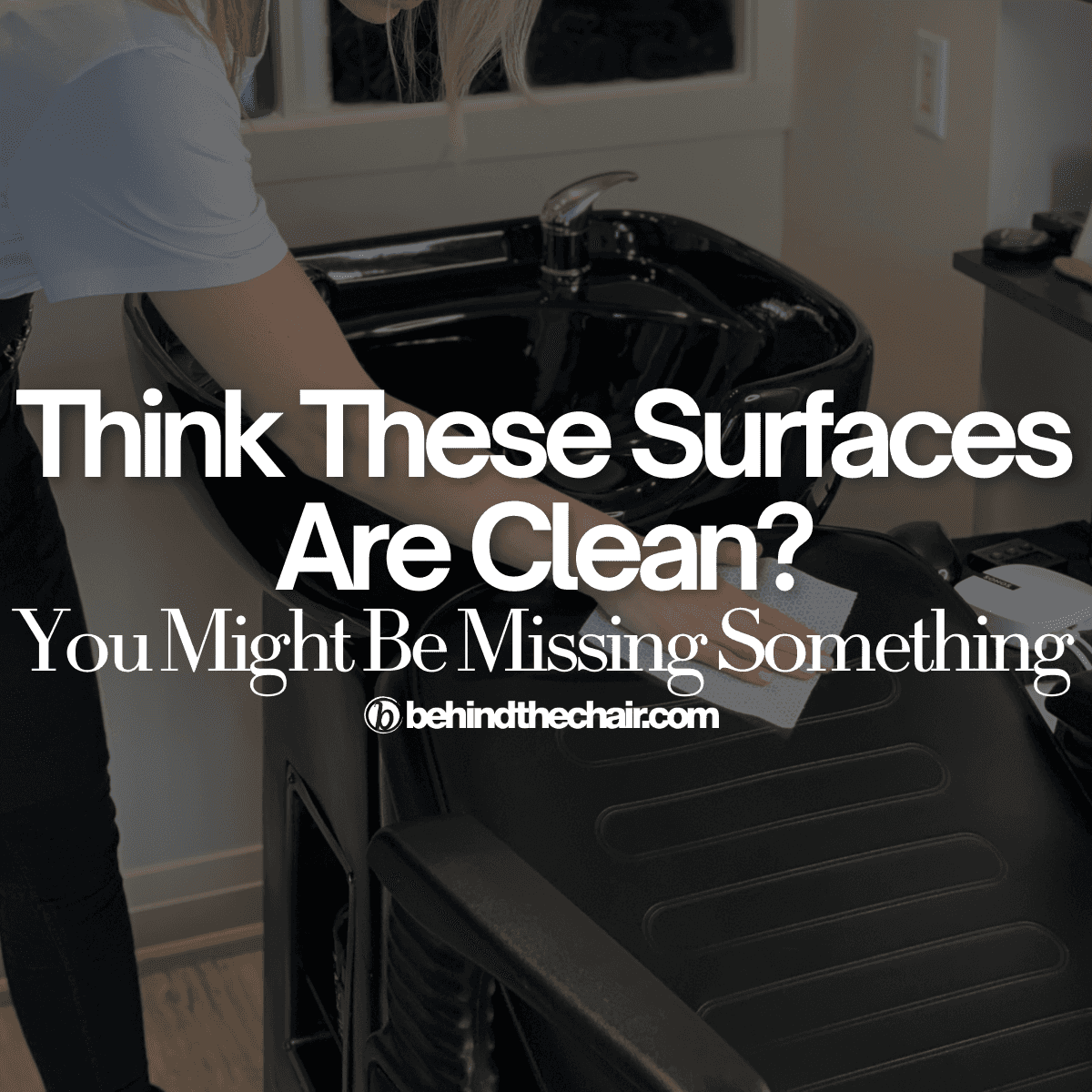 Someone wiping a shampoo chair