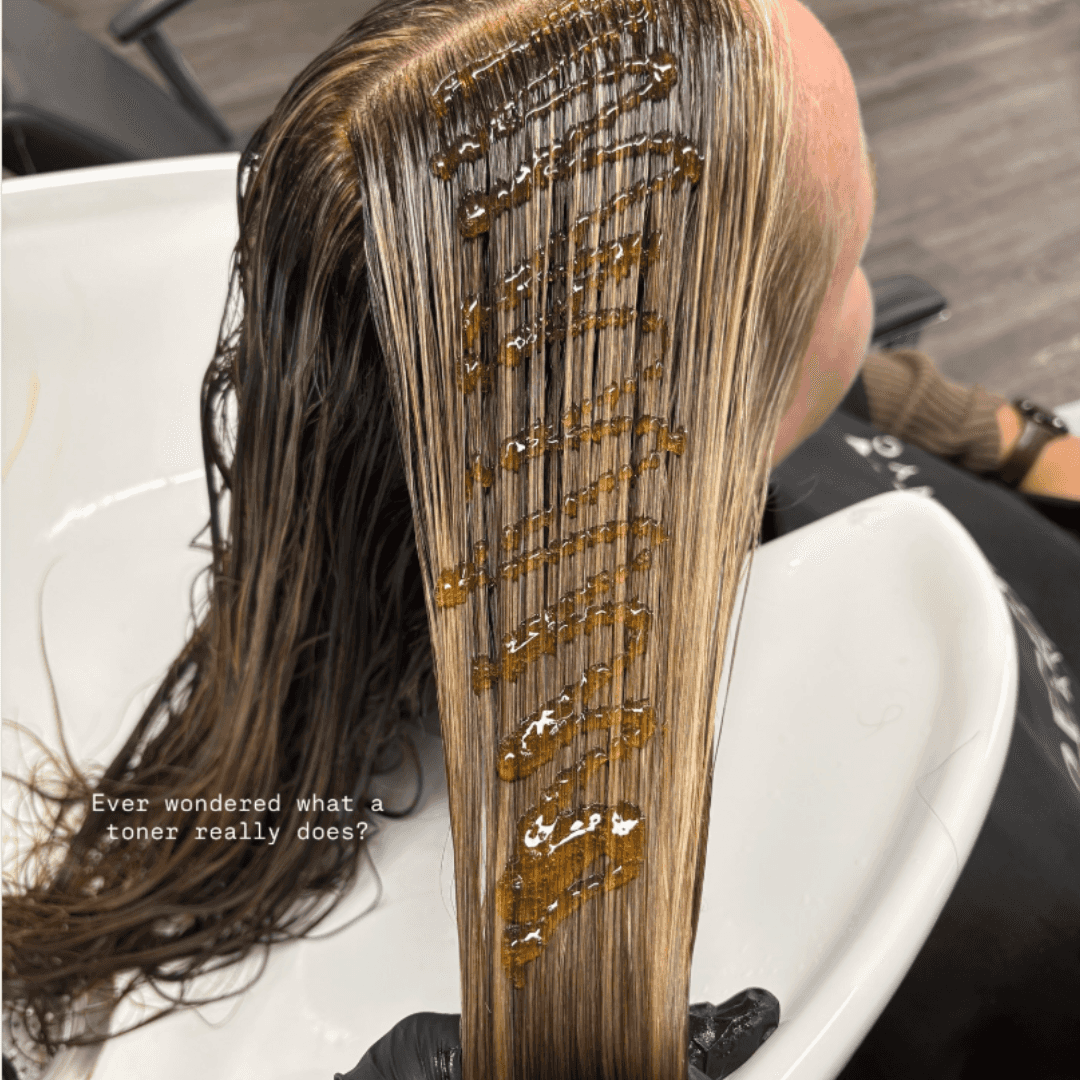 hair gloss being applied