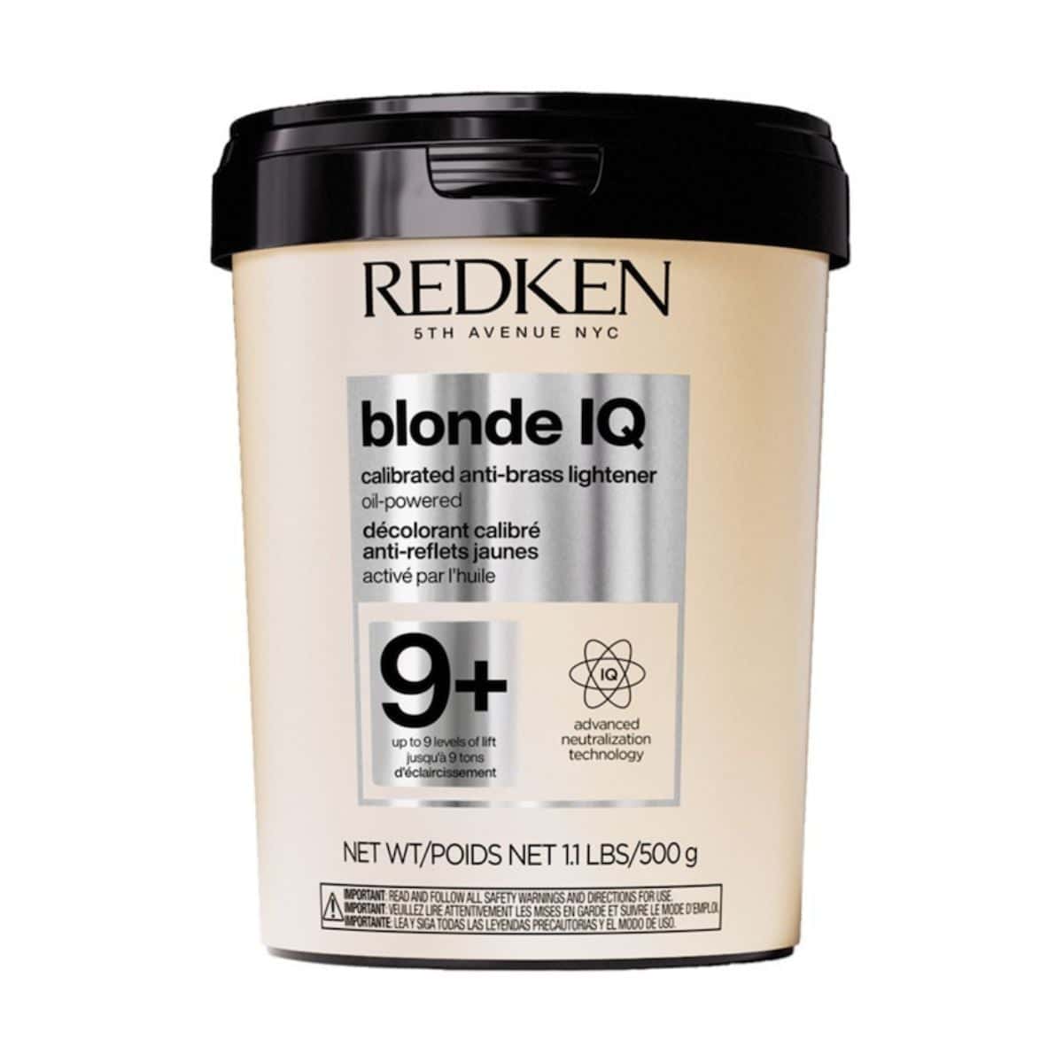 Redken Blonde IQ 9+ calibrated anti-brass lightener in a beige tub with black lid.