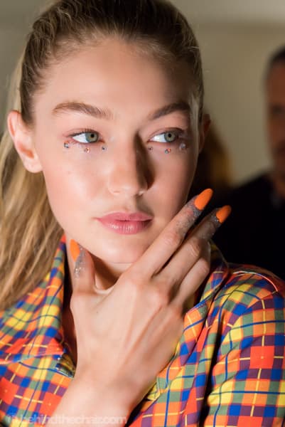 Jeremy Scott SS18 
Hair by Eugene Souleiman for Wella Professionals
Nails by Miss Pop for CND 