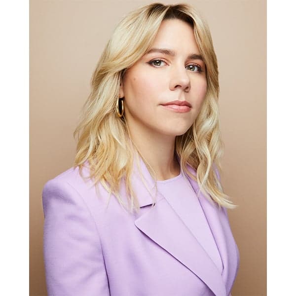 Chelsea Riggs headshot as CEO of amika brand