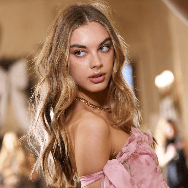 Blonde model with soft, voluminous waves at LoveShackFancy NYFW 2025.