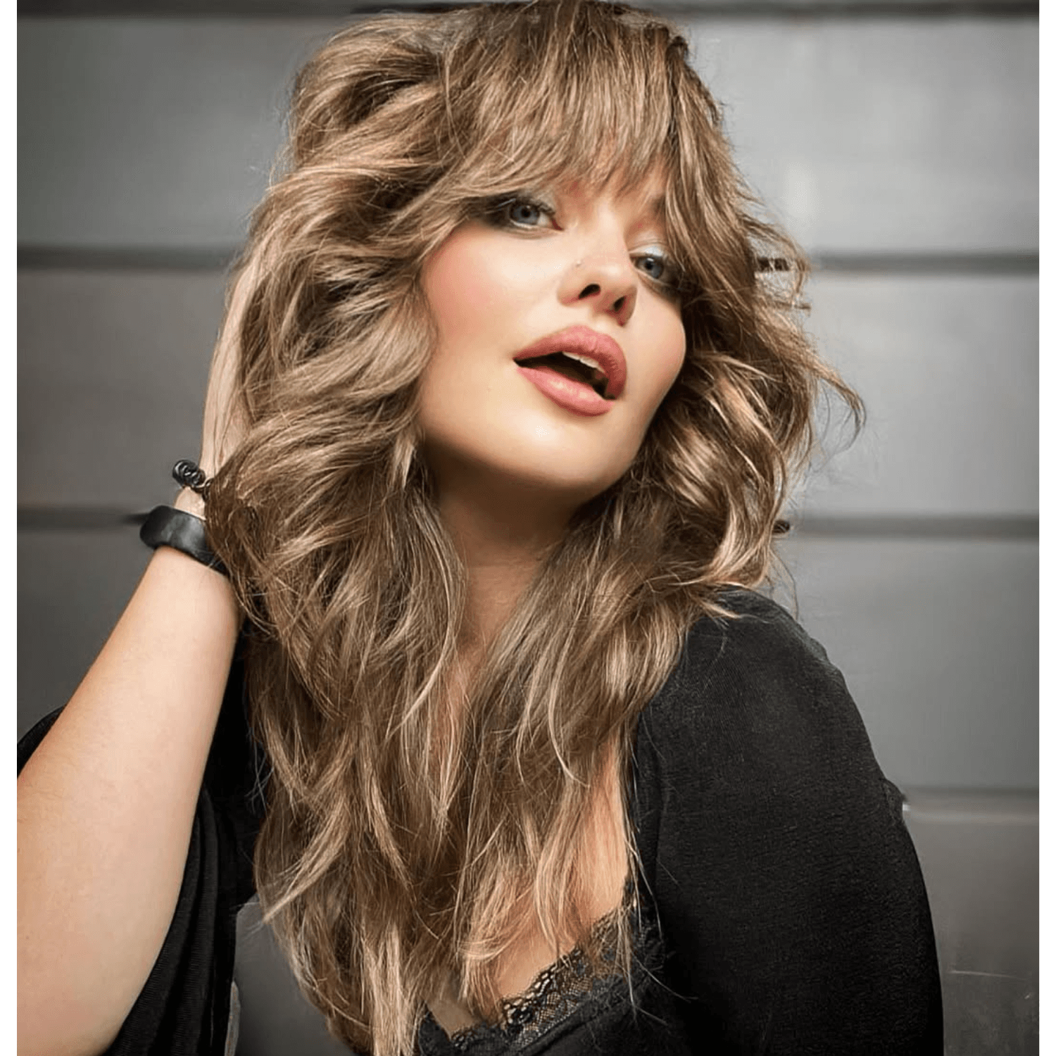 A retro brunette shag haircut by @rachelwstylist.