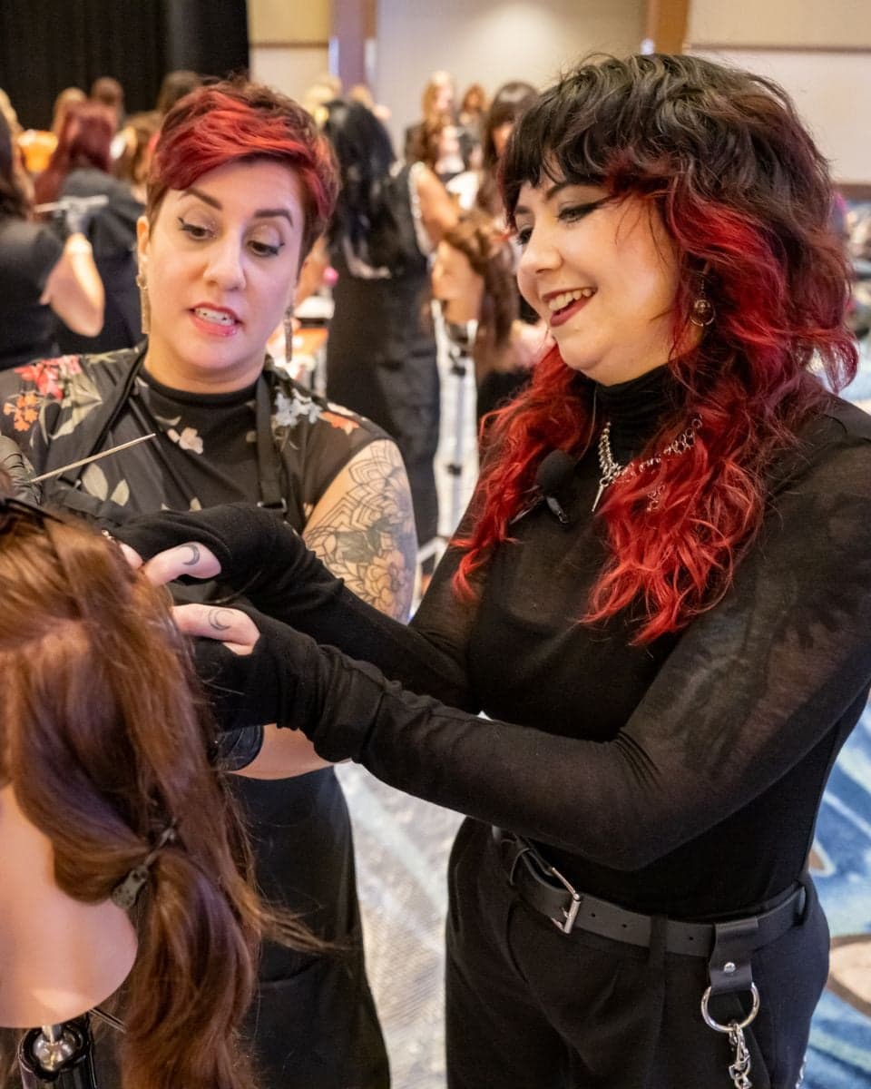 Ulta Beauty stylists collaborate on a mannequin during hands-on trendspiration education at Field Leadership Conference.
