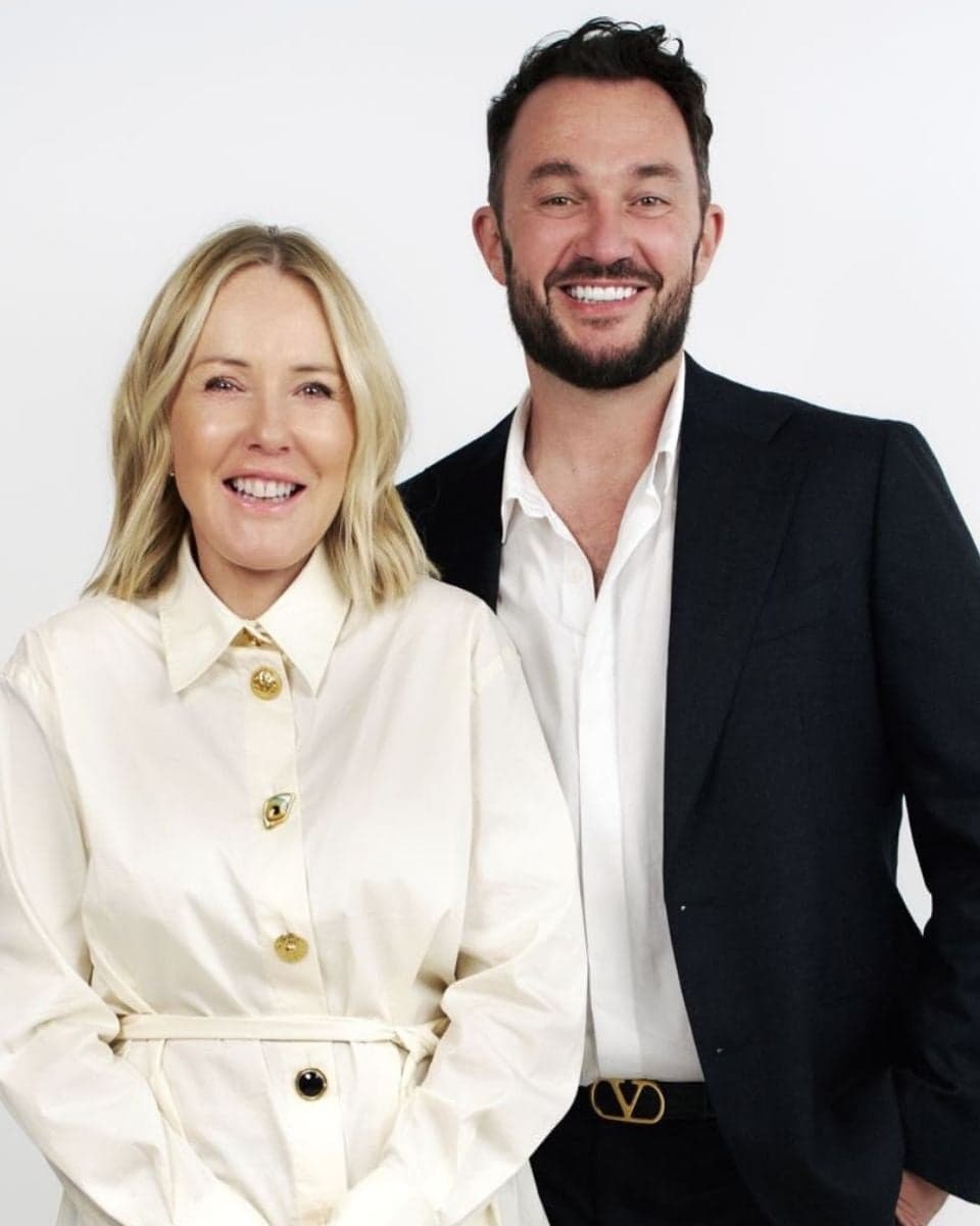 O&M Founder and CEO Jose Bryce Smith stands beside newly appointed Managing Director Chris Hammond against a white background.