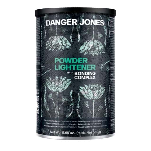 A black cylindrical container of Danger Jones Powder Lightener with Bonding Complex. The packaging features a repeating teal floral pattern with bold white and teal text. The label states the product name and net weight of 17.65 oz (500 g).