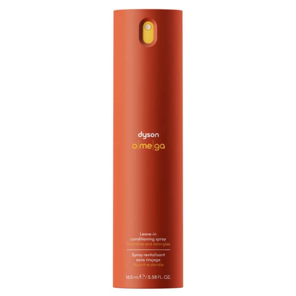 Dyson Omega™ Leave-In Conditioning Spray in a tall, matte coral cylindrical bottle labeled 165 mL / 5.58 fl oz