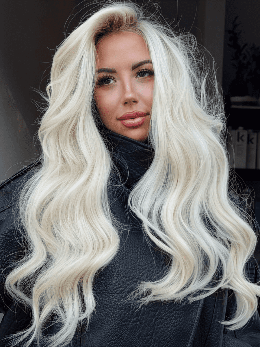 level 10 blonde toning long blonde soft curls Photo Credit Instagram via @amy_sandhairco