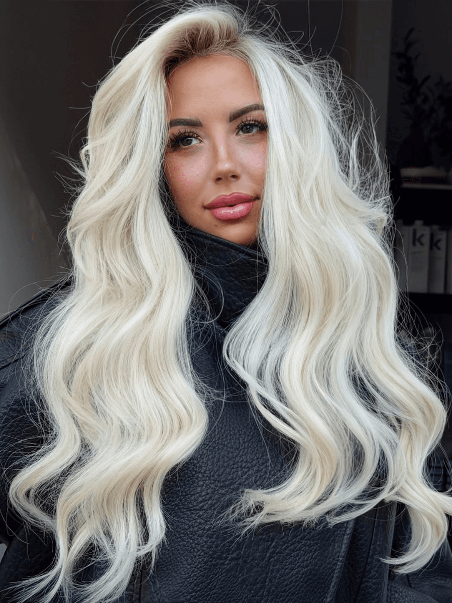 level 10 blonde toning long blonde soft curls Photo Credit Instagram via @amy_sandhairco