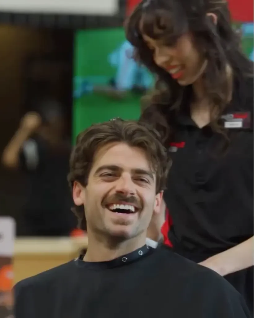 barber-and-hairstylist-consultation-barber-with-client-dj-hootie-laughing-Photo-Credit-Instagram-via-@sportclipshaircuts-1024x1024