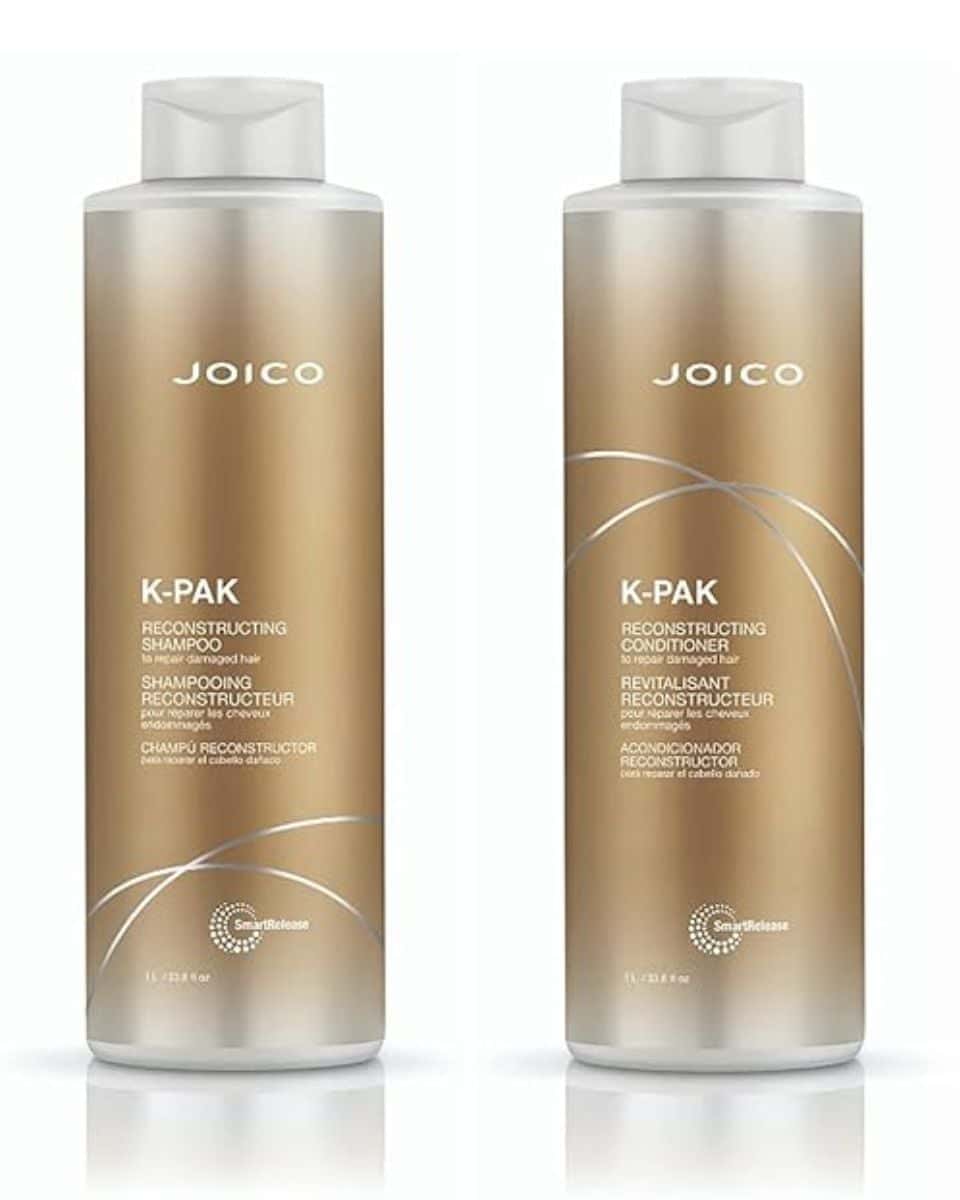 Joico K-PAK Reconstructing Shampoo and Conditioner bottles, a damage-repairing haircare duo formulated to help strengthen, smooth and add shine to breakage-prone hair.