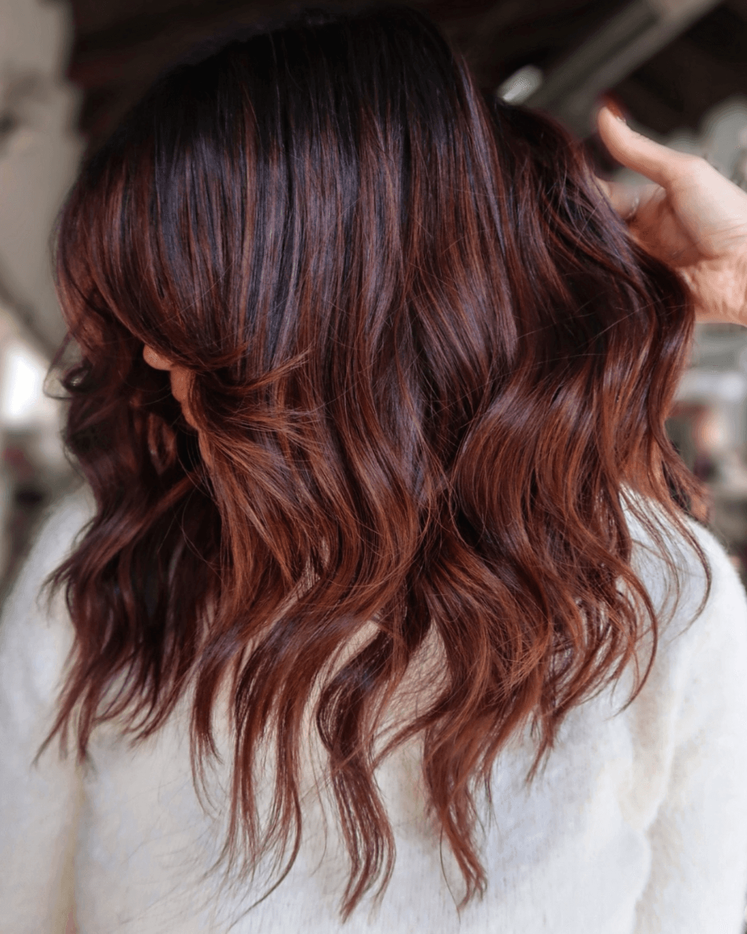rich dimensional auburn with chocolate Photo Credit Instagram via @larisadoll