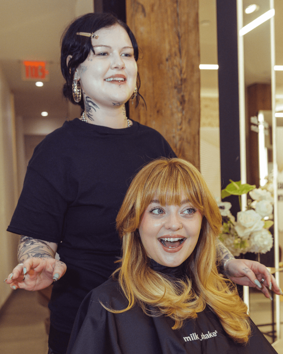 Lauren Freas reacts to her finished style after receiving the milk_shake Everlasting Bonds in-salon treatment.
