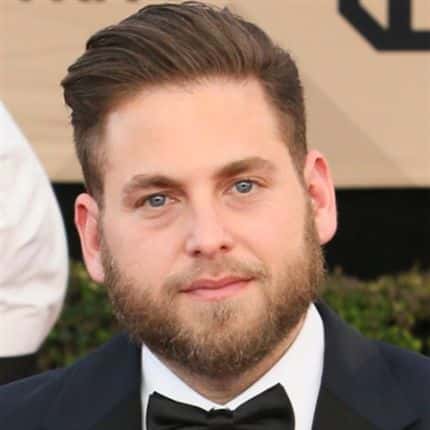 Jonah Hill's Slicked Back Pomp and Beard Combo