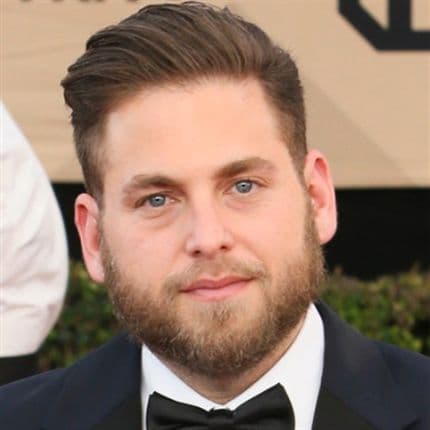 Jonah Hill's Slicked Back Pomp and Beard Combo