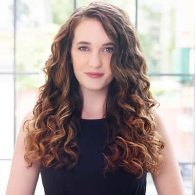 curly hair balayage finished hairstyle