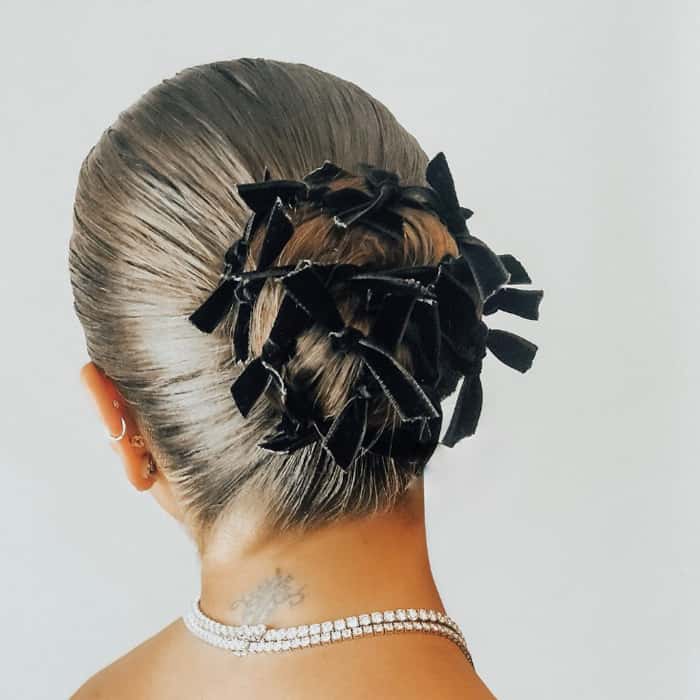 ashley graham 2019 oscars hair academy awards justine marjan bow bun