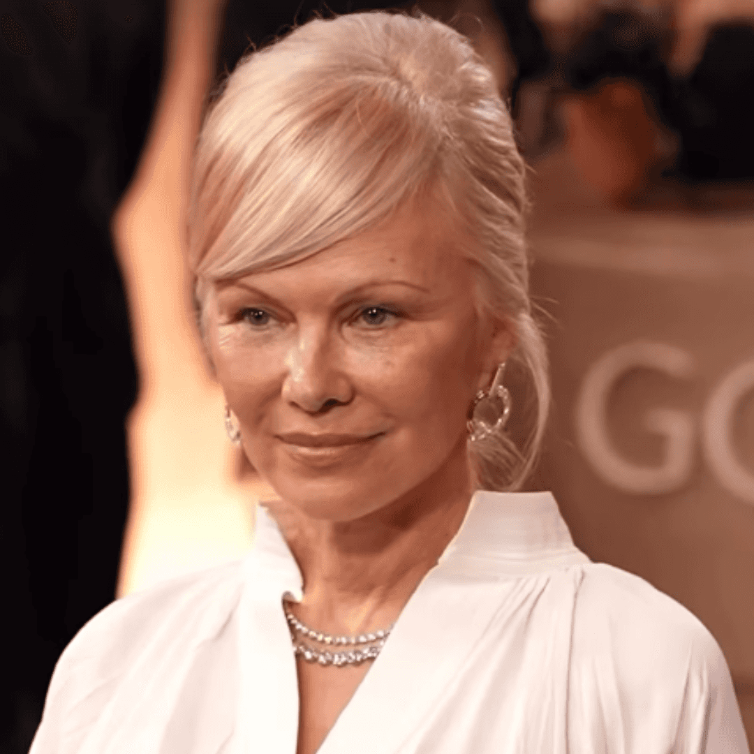 Pam Anderson platinum french twist front view red carpet