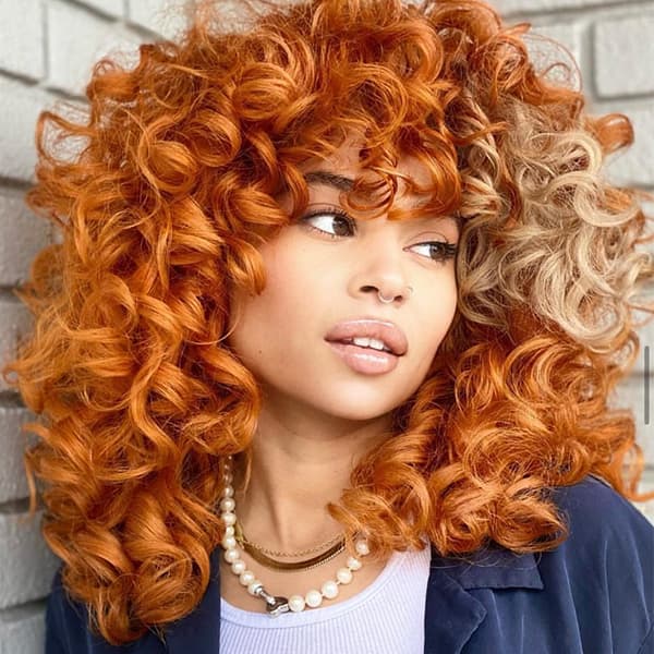 Trendy haircuts trending shag cut retro hair colorblock curls copper curly cut