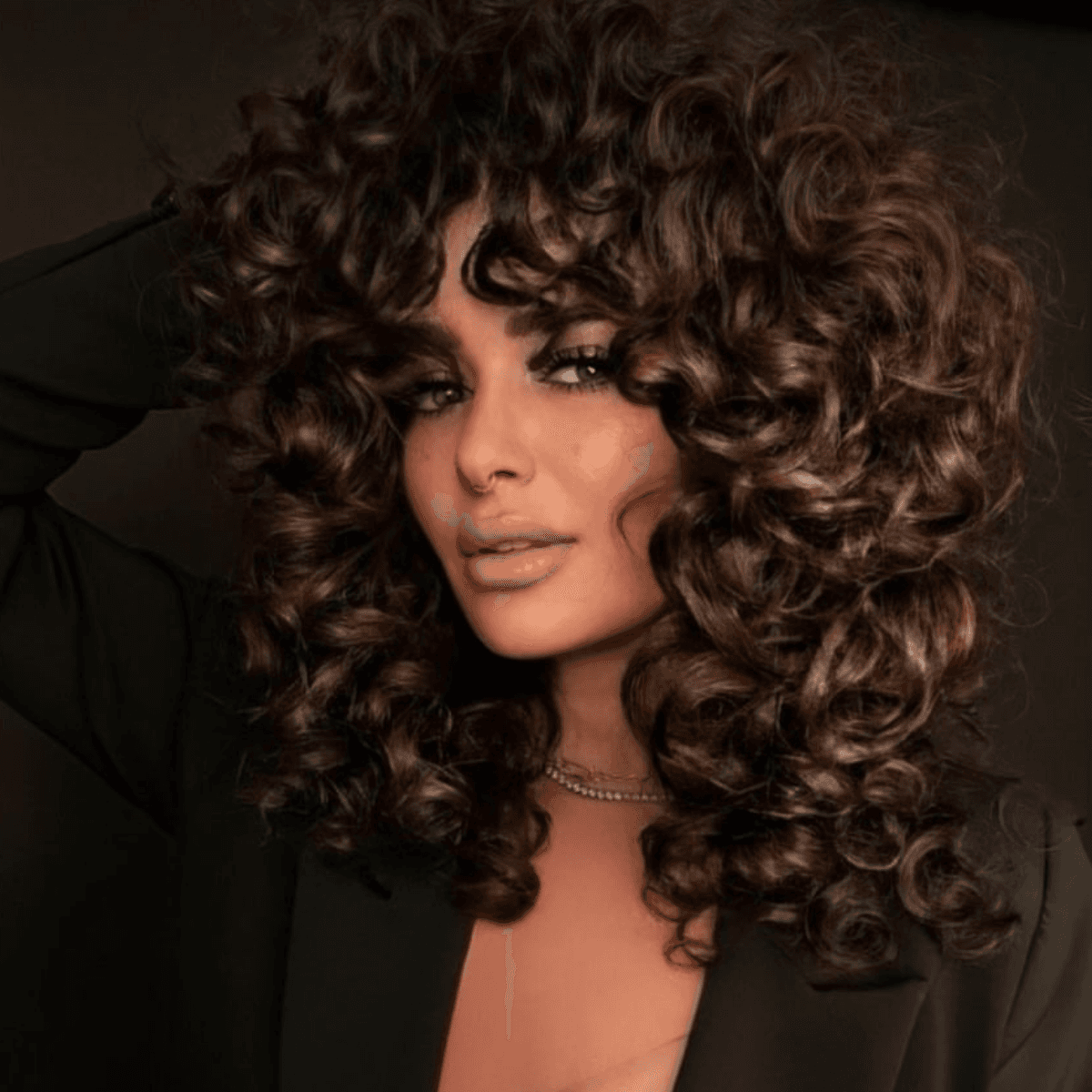 curly sparkly brunette shag with fringe