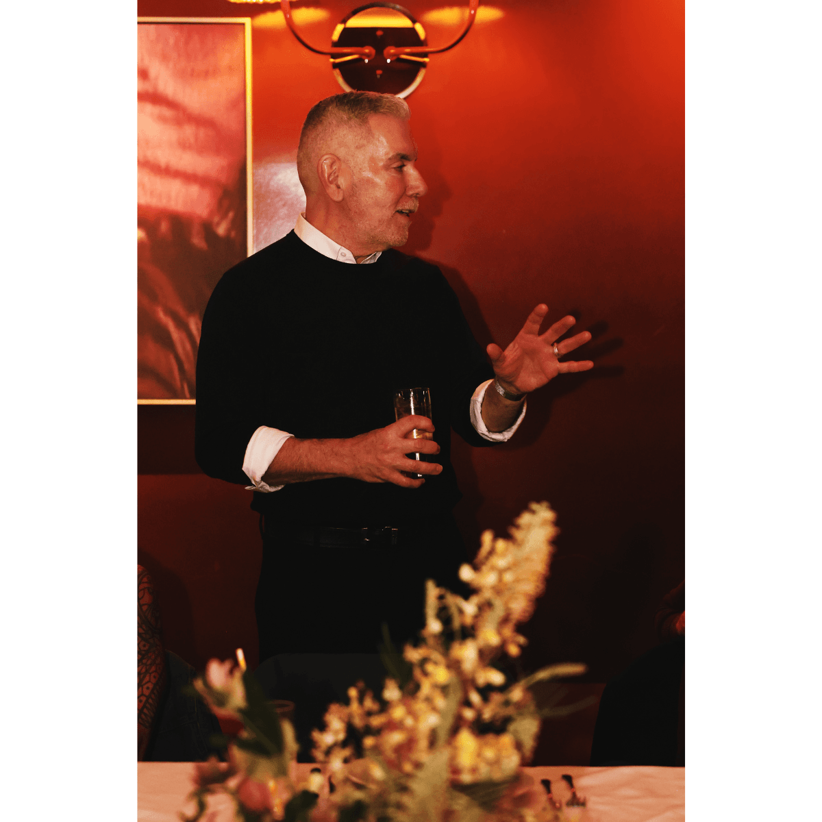 John Moroney, SVP of Global Education for milk_shake® talking to the stylists at dinner | Photo courtesy of milk_shake®