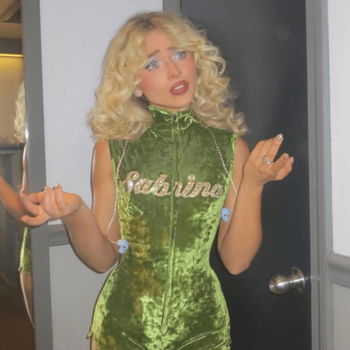 sabrina carpenter blonde sabrina in a green outfit Sabrina Carpenter Photo Credit Instagram via @_hairbylaurie