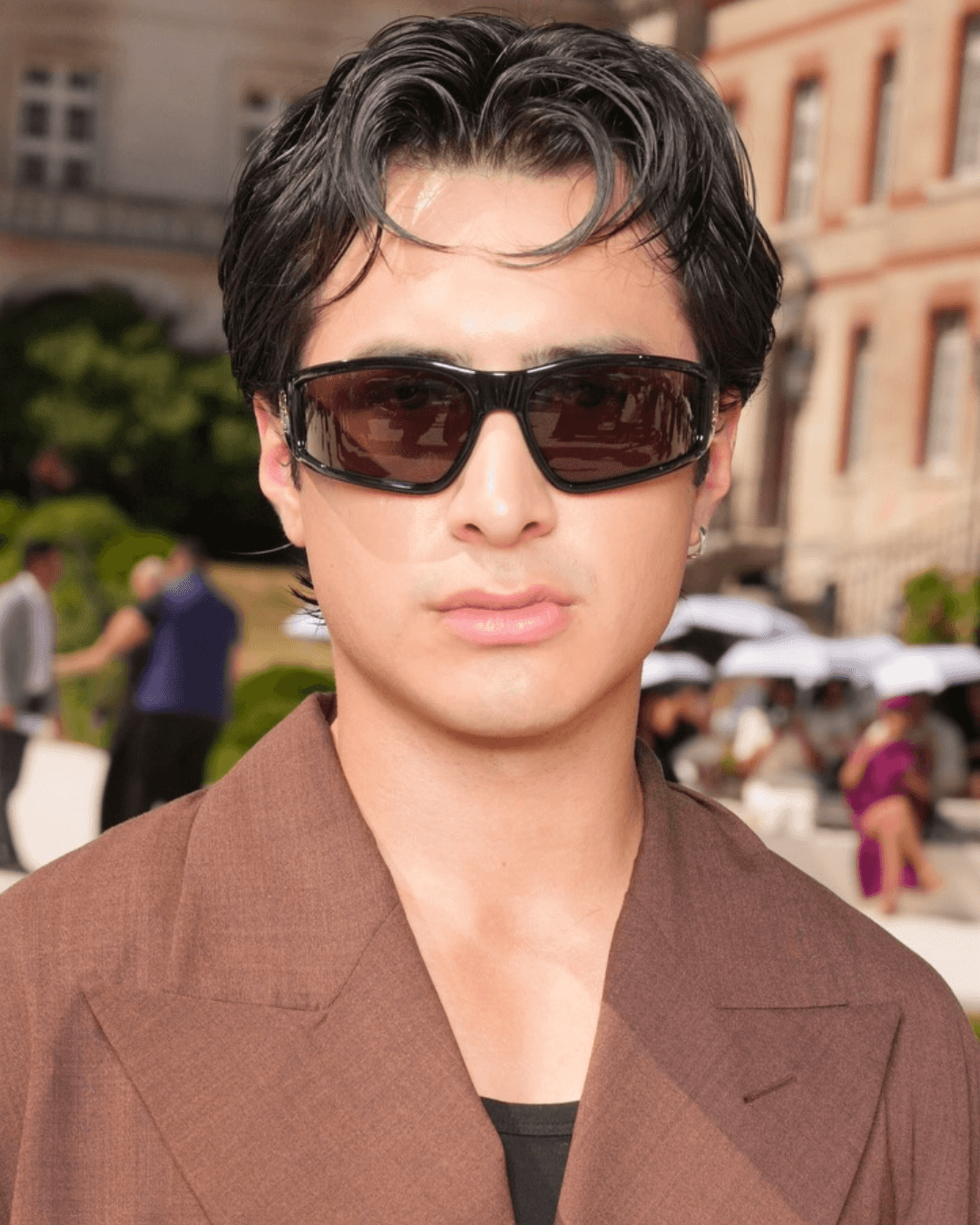 Hudson Williams wearing a modern '90s heartthrob hairstyle with soft movement, piecey texture and lived-in shine Hudson Williams Photo Credit Instagram via @by.aikaflores